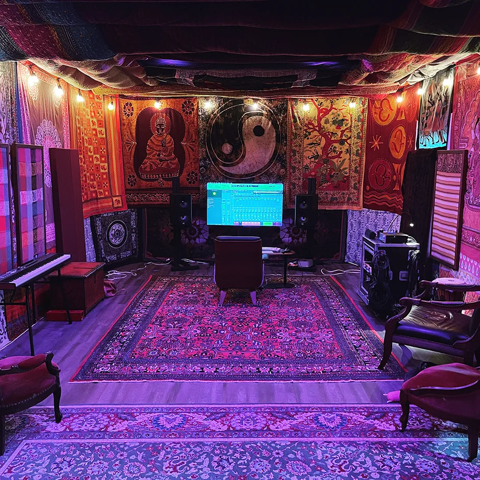 Mixerman's mix and production suite in Asheville, NC — tapestried walls, string lights, and monitors at the mix position